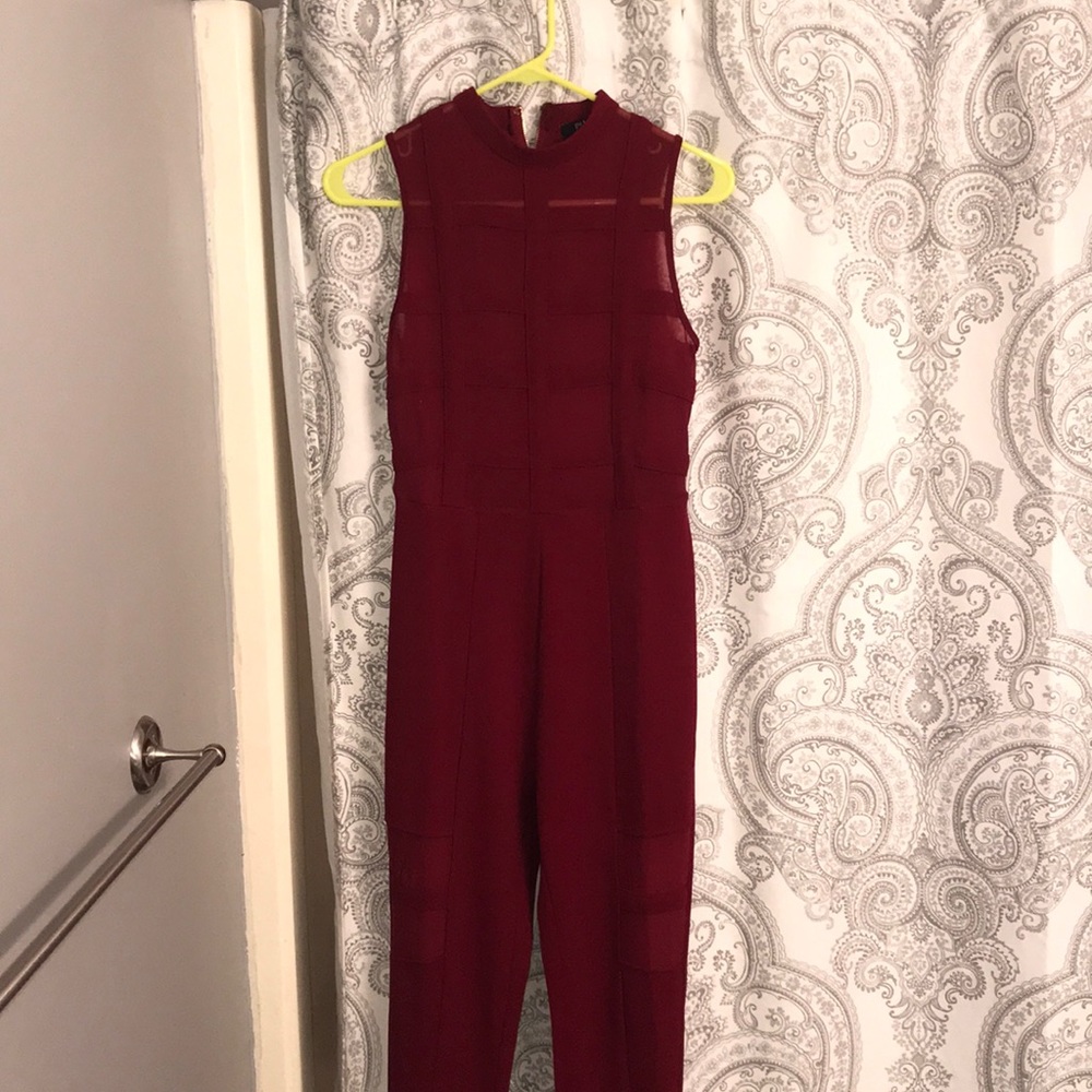 Maroon jumpsuit with sheer top